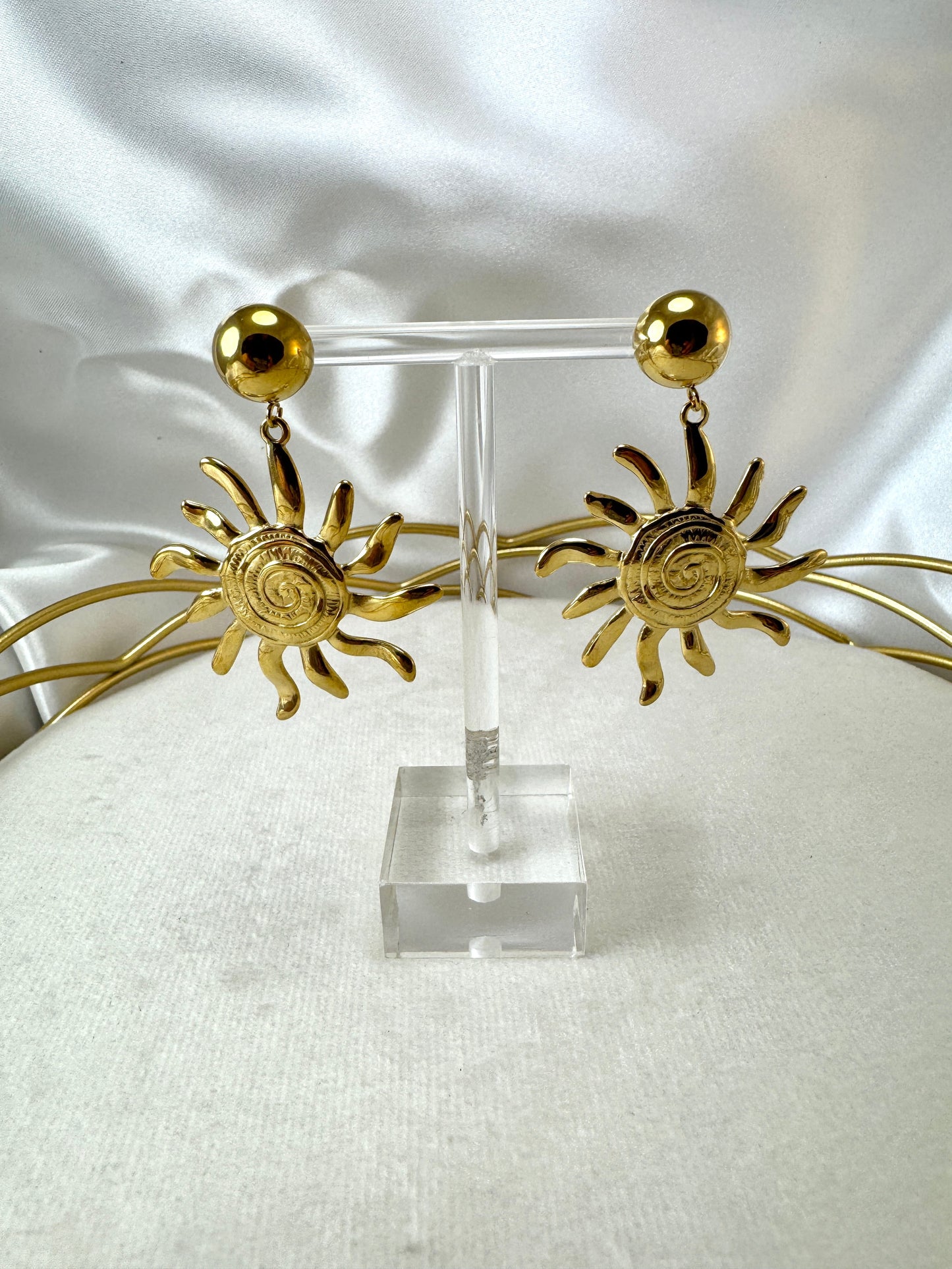 Orecchini con sole pendente