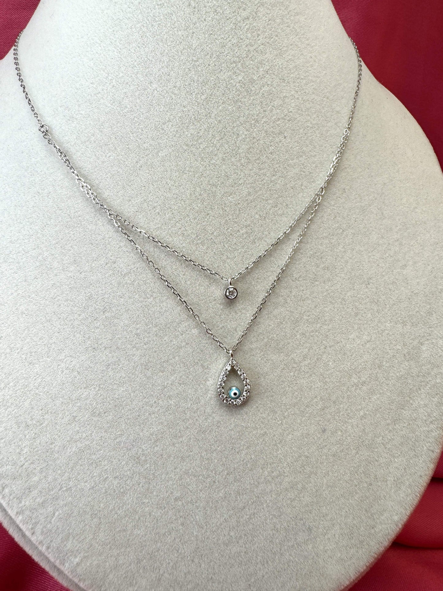 Collana doppio filo con goccia, occhio turco e punto luce