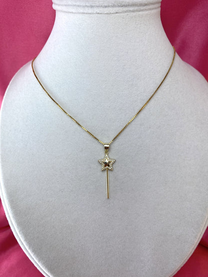 Collana con bacchetta magica dorata