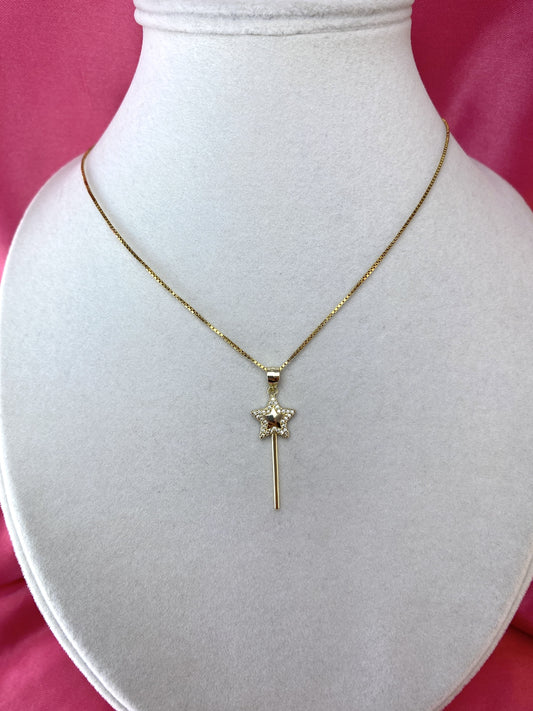Collana con bacchetta magica dorata