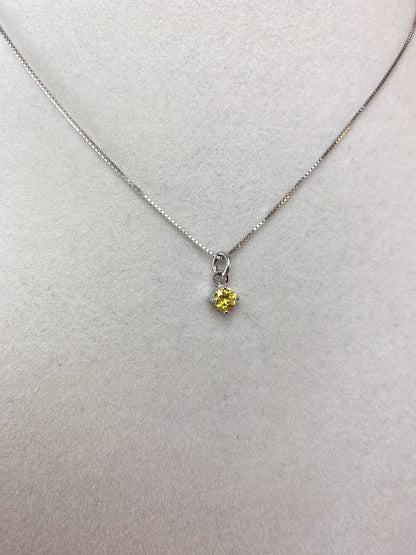 Collana con micro punto luce giallo