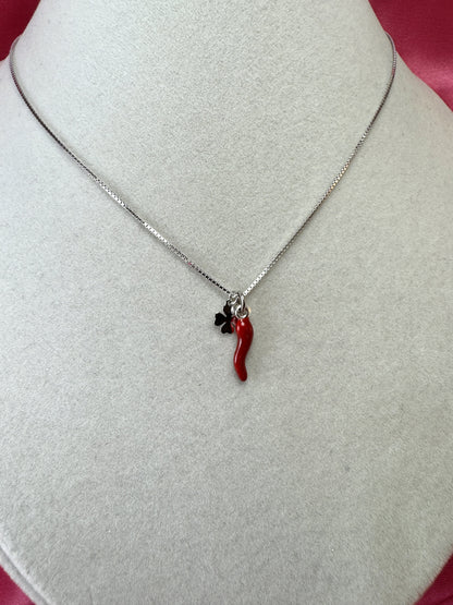 Collana con cornino e quadrifoglio