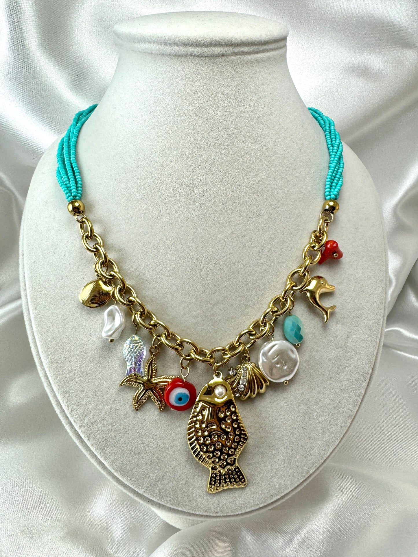 Collana fili in resina e ciondoli marini