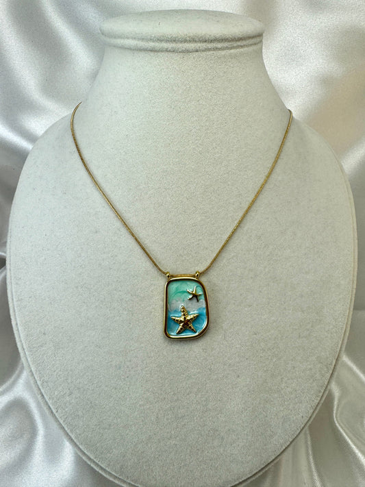 Collana con rettangolo e stelle marine