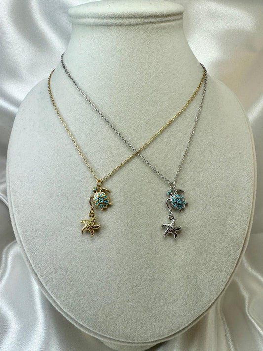 Collana con tartaruga e stella marina pendente