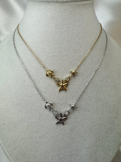 Collana con tre ciondoli marini non pendenti