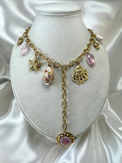 Collana con ciondoli marini rosa e pendente