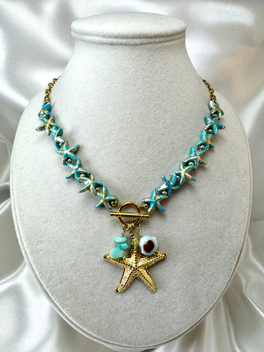 Collana con stelle marine azzurre e pendente