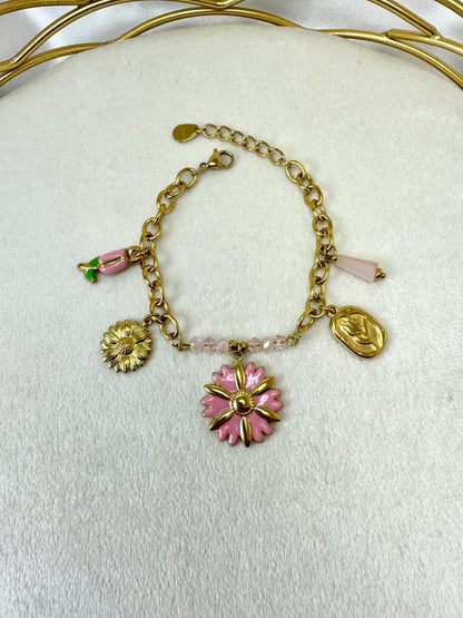 Bracciale con fiore colorato, ciondoli e cristalli