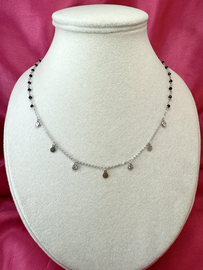 Collana con spinello nero, tondi e zirconi