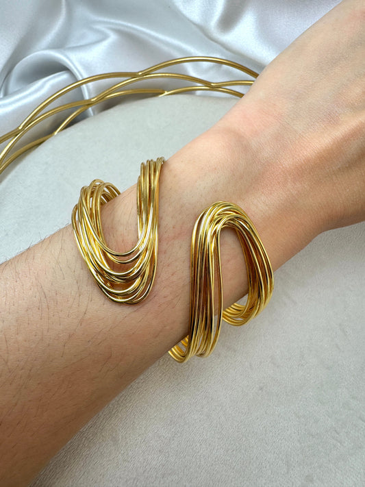 Bracciale rigido multifilo ondulato