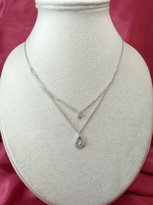 Collana doppio filo con goccia, occhio turco e punto luce