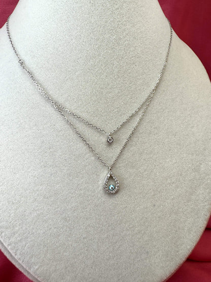 Collana doppio filo con goccia, occhio turco e punto luce