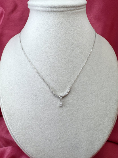 Collana con arco, cuoricino e goccia