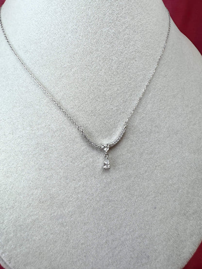 Collana con arco, cuoricino e goccia