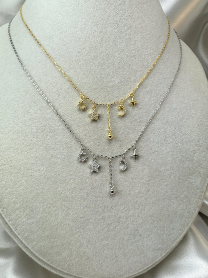 Collana con sole, stella, luna, pallina pendenti