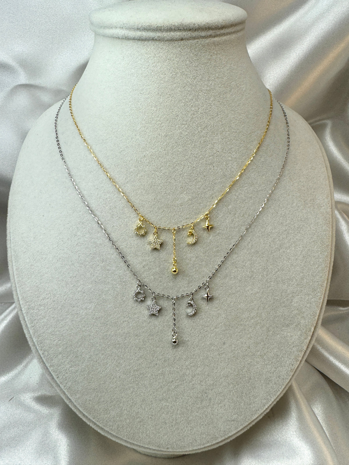 Collana con sole, stella, luna, pallina pendenti