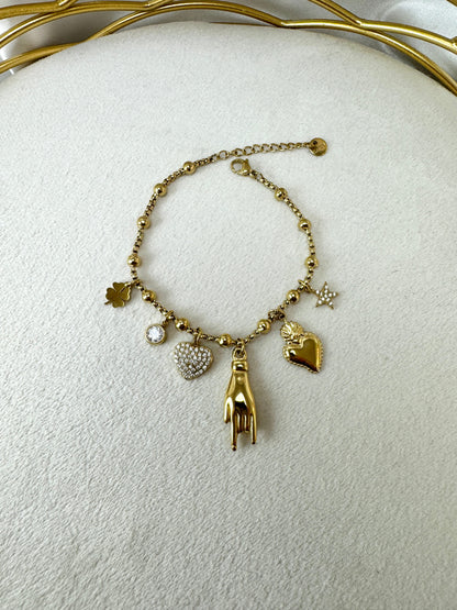Bracciale con scongiuro e ciondoli