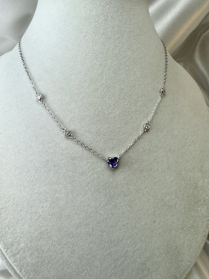 Collana con cuore viola e punti luce