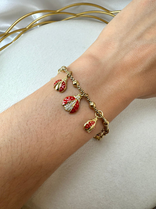 Bracciale a palline con coccinelle