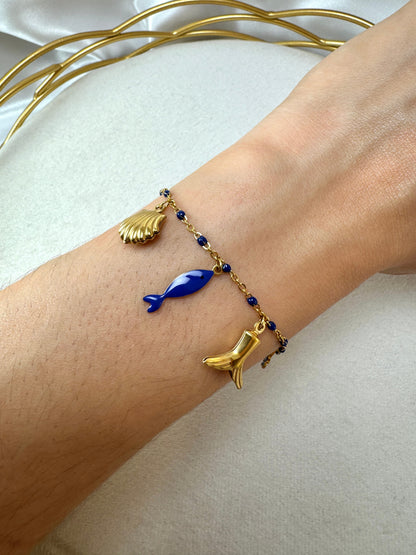 Bracciale con smalto blu e ciondoli