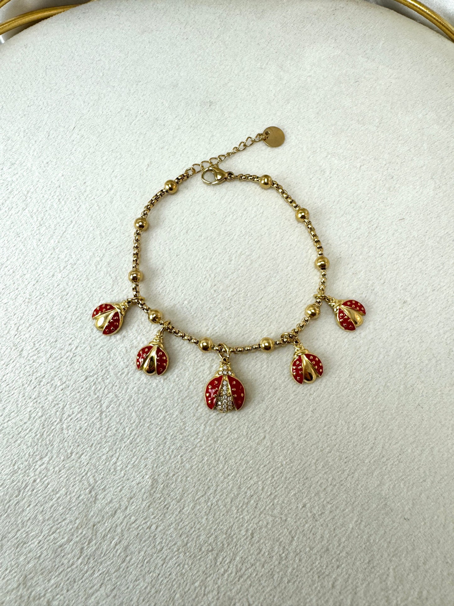 Bracciale a palline con coccinelle