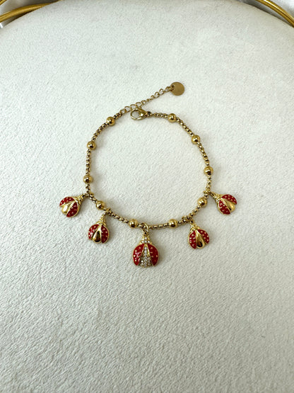 Bracciale a palline con coccinelle