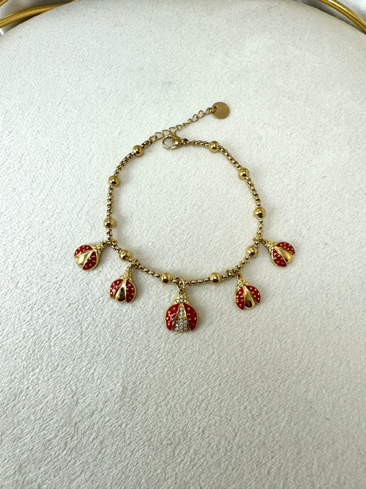 Bracciale a palline con coccinelle