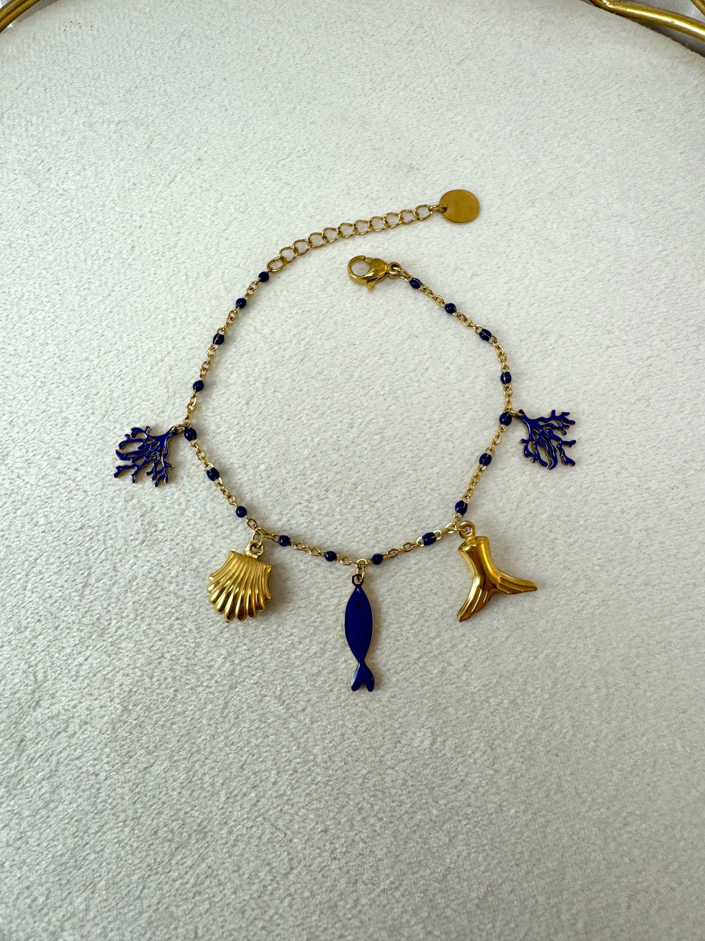 Bracciale con smalto blu e ciondoli