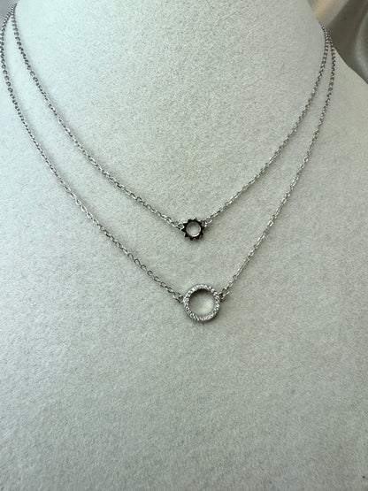 Collana doppio fino con tondo di zirconi e sole