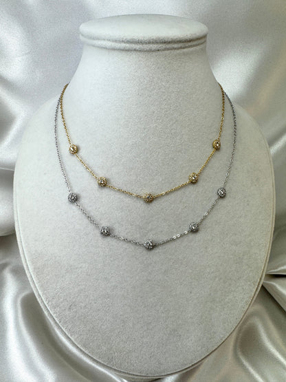 Collana con tondini di brillantini