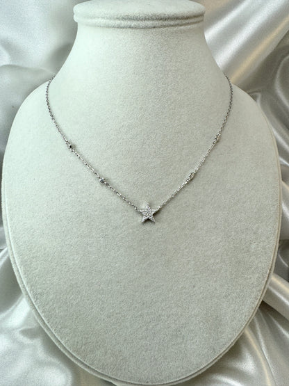 Collana con stella di zirconi e punti luce