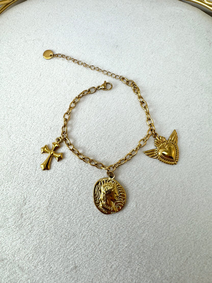 Bracciale con monera, croce e cuore sacro