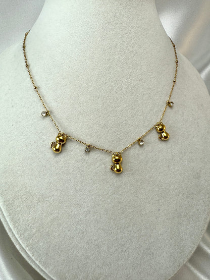 Collana con gatti e punti luce