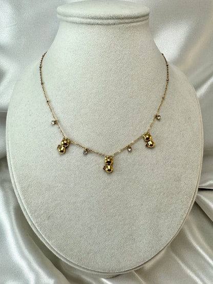 Collana con gatti e punti luce