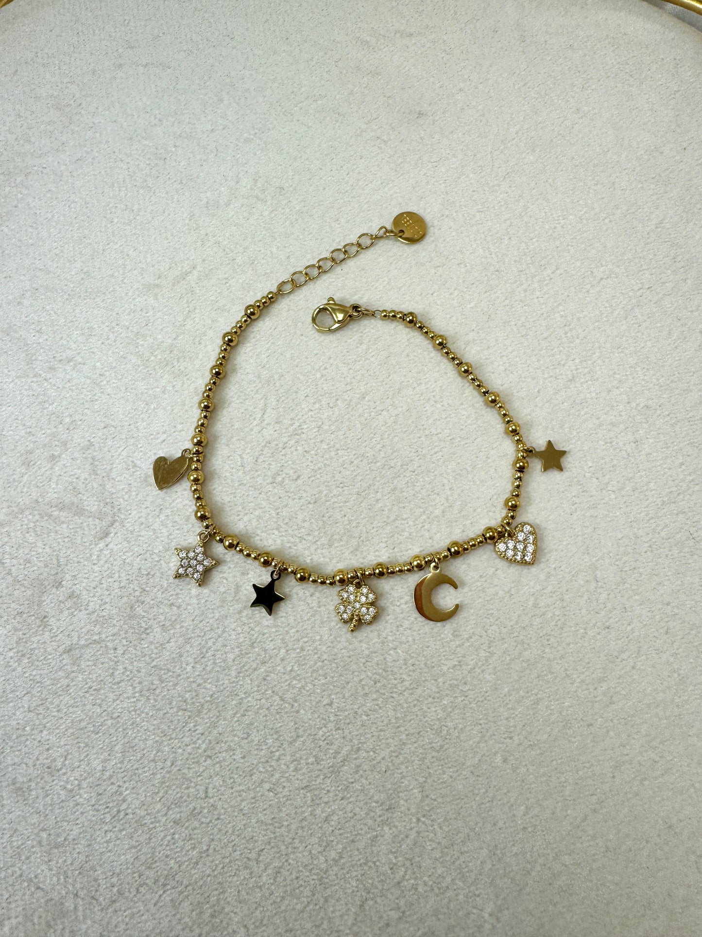 Bracciale con micro palline e ciondoli